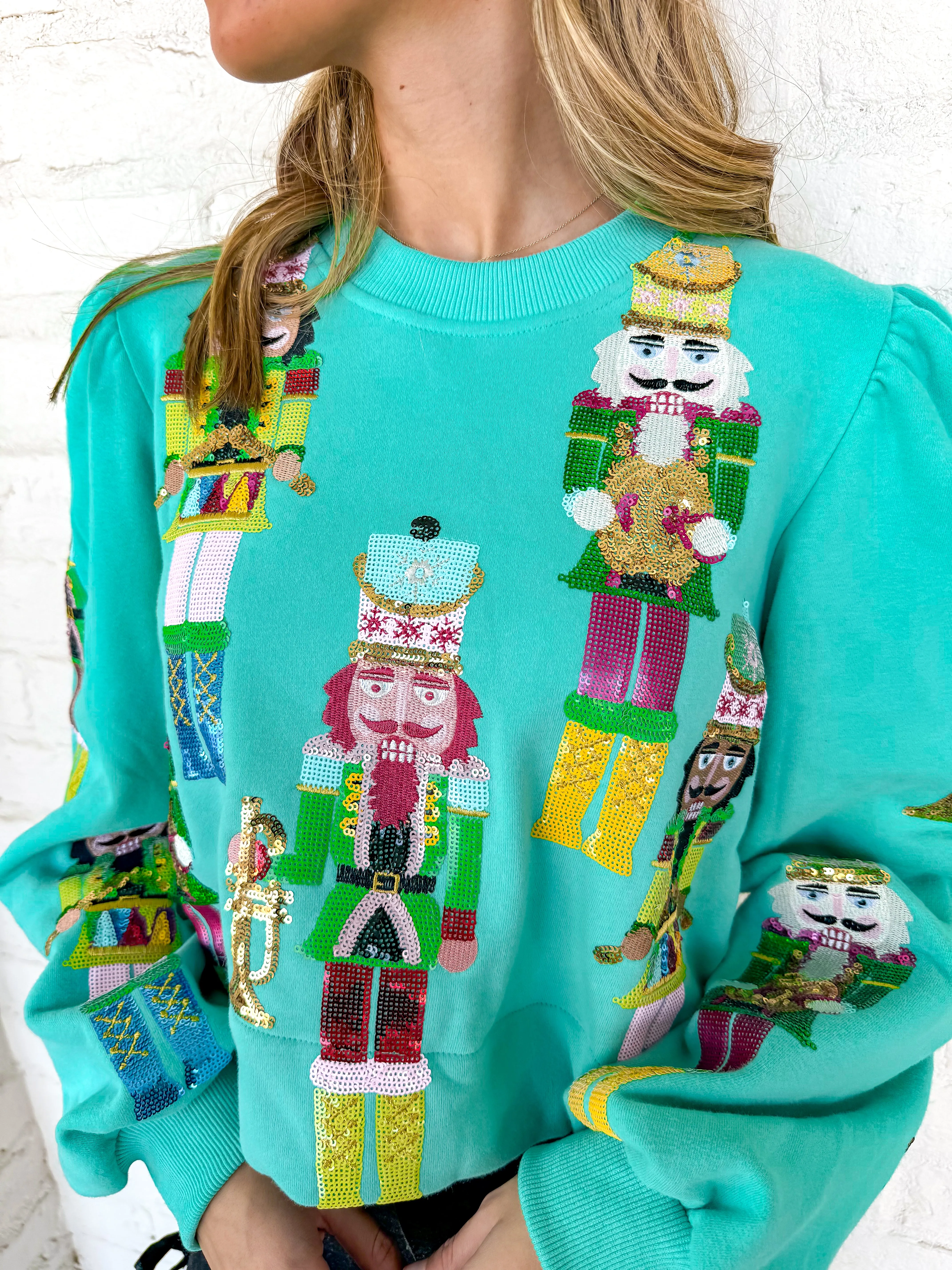 Queen Of Sparkles Teal Nutcracker Band Poof Sleeve Sweatshirt