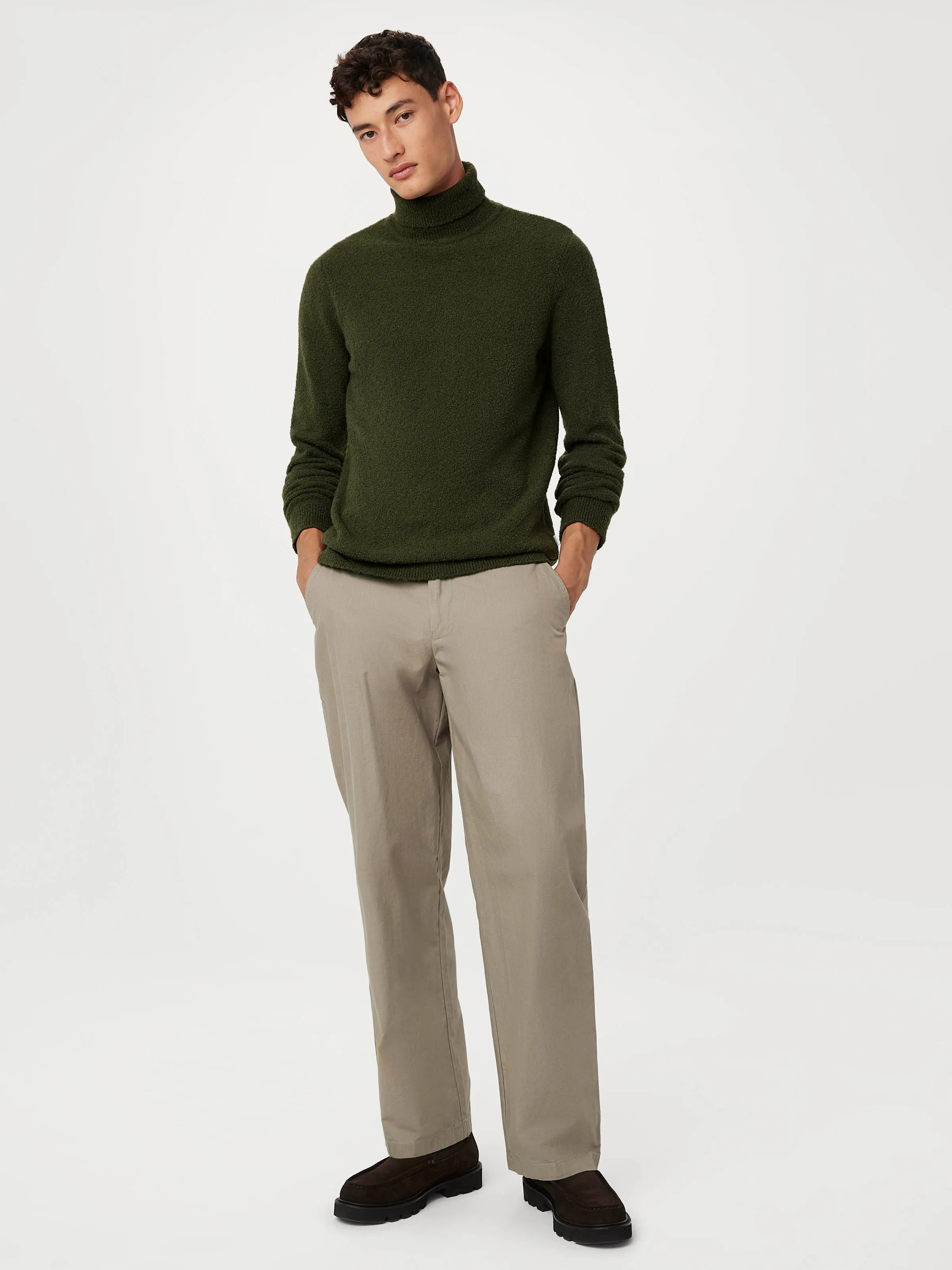 The Seawool® Boucle Turtleneck in Dark Green