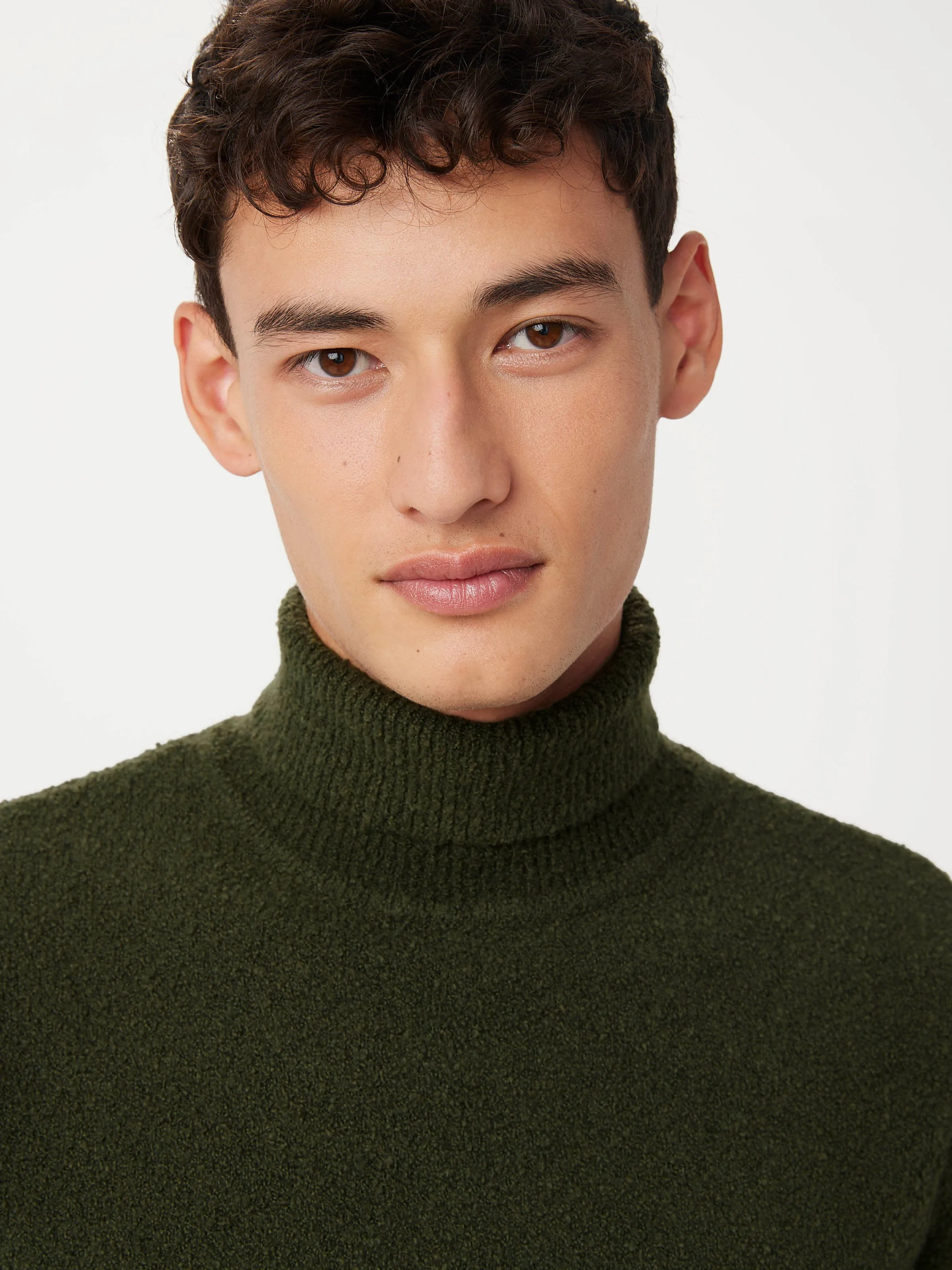 The Seawool® Boucle Turtleneck in Dark Green