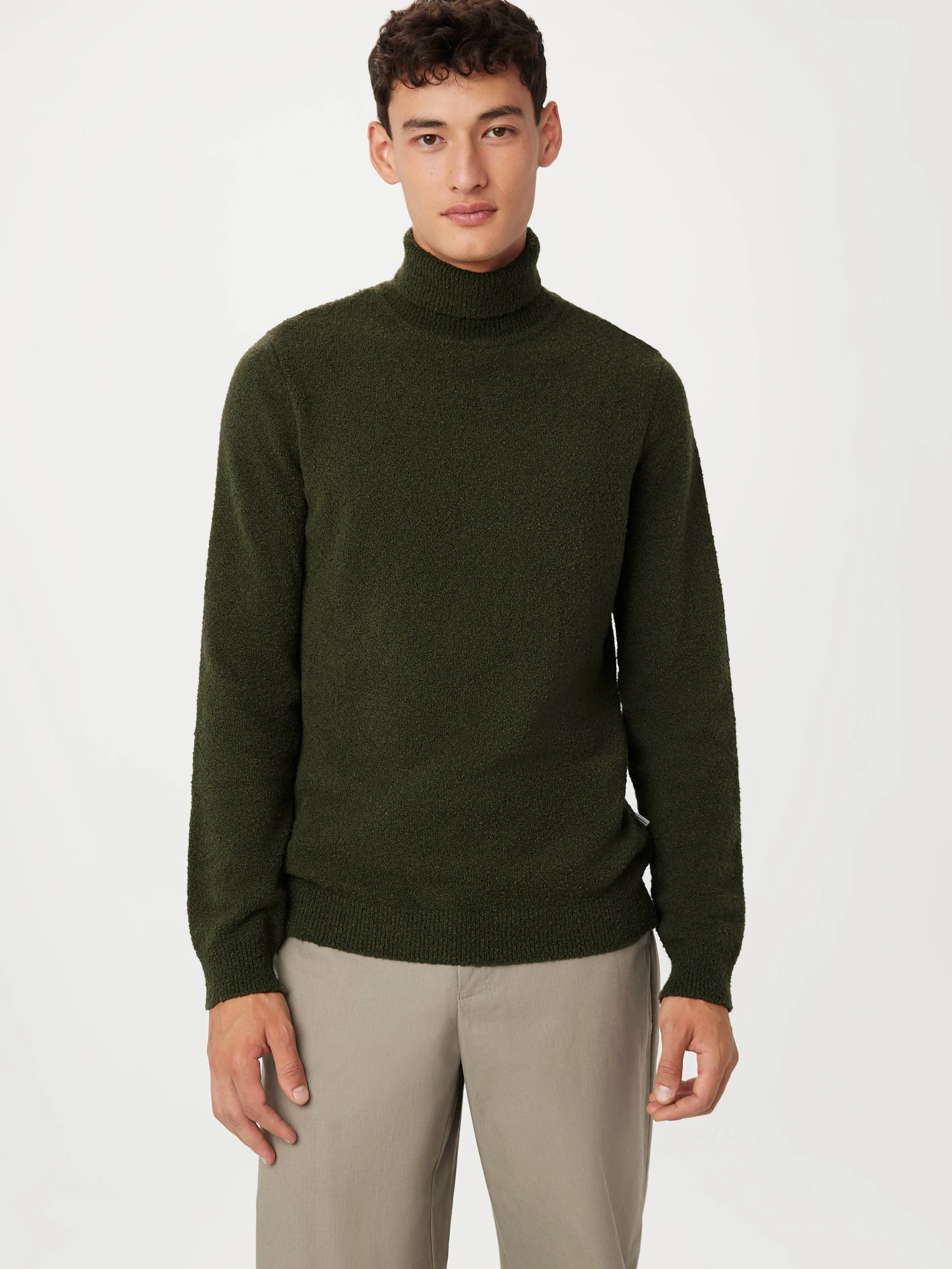 The Seawool® Boucle Turtleneck in Dark Green